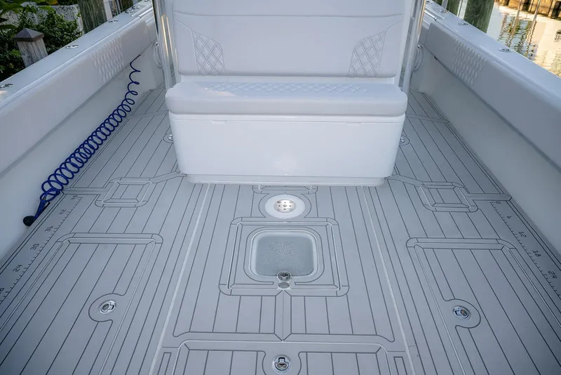 Slide: The Image of 2020 Contender 44 ST boat deck with seating and storage compartments. - 17