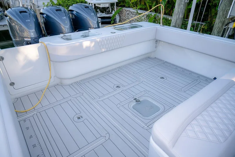 Slide: The Image of Spacious deck of 2020 Contender 44 ST boat with triple V8 engines. - 19