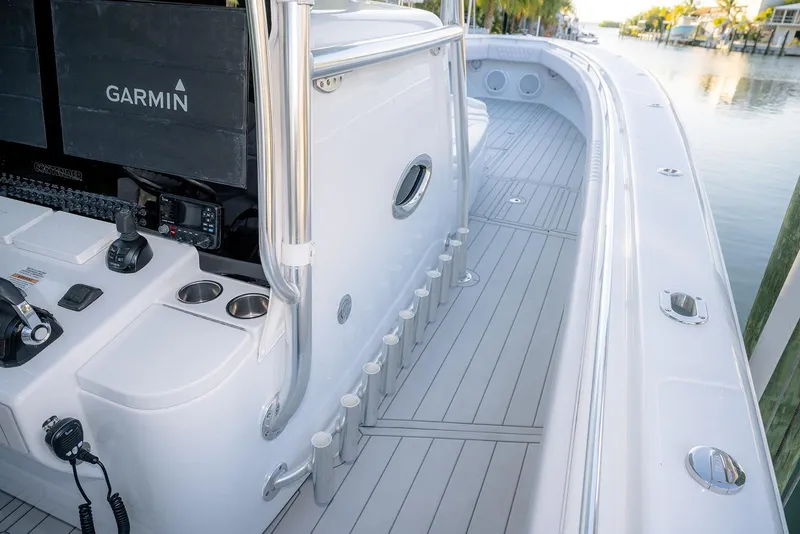 Slide: The Image of 2020 Contender 44 ST boat interior with Garmin electronics and sleek design. - 22