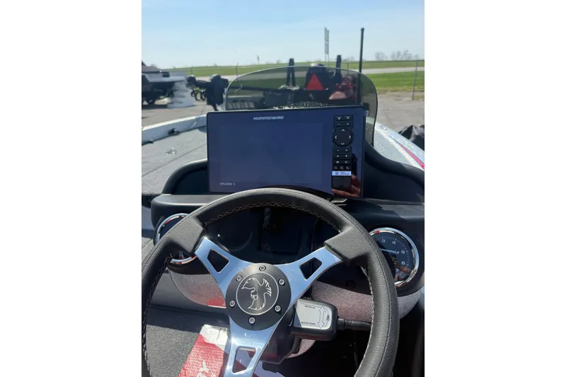 Slide: The Image of Steering wheel and dashboard of 2026 Phoenix 819 ZXL boat with Humminbird display. - 10