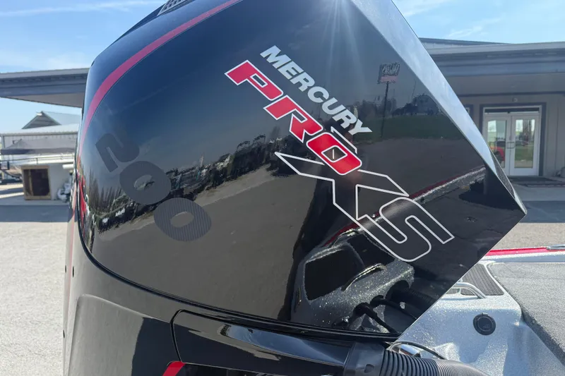 Slide: The Image of Mercury Pro XS engine on a 2026 Phoenix 819 ZXL boat, outdoor setting. - 17