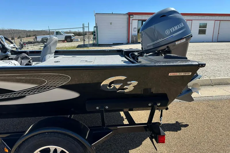 Slide: The Image of 2020 G3 Sportsman 1610 Camo boat with Yamaha motor in outdoor setting. - 8