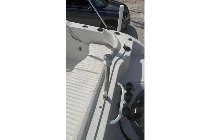 Slide: The Image of 2012 Sea Fox 216 Dual Console boat interior with seating and railing details. - 15