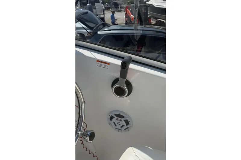 Slide: The Image of Interior view of a 2012 Sea Fox 216 Dual Console boat control panel. - 25