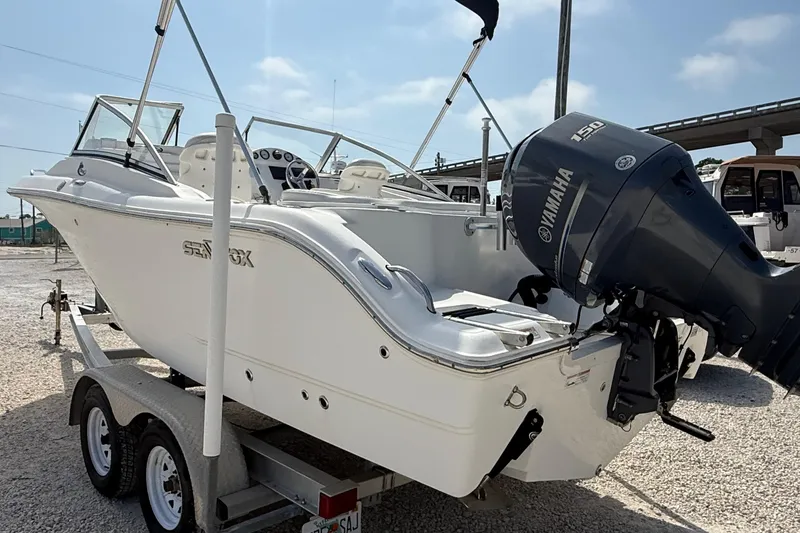 Slide: The Image of 2012 Sea Fox 216 Dual Console boat with Yamaha 130 engine on trailer. - 3