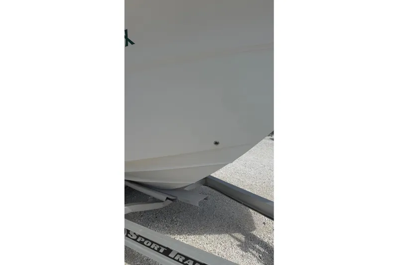 Slide: The Image of 2012 Sea Fox 216 Dual Console boat on trailer, side view. - 7