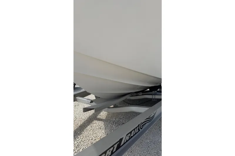Slide: The Image of 2012 Sea Fox 216 Dual Console boat hull on trailer, close-up view. - 9