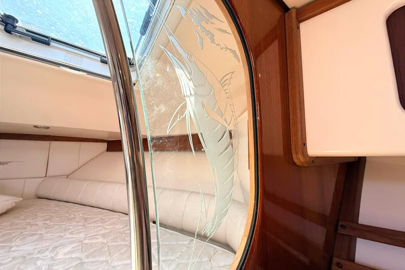 Slide: The Image of Interior of 2008 Grady-White Express 360 boat with etched glass marlin design. - 21