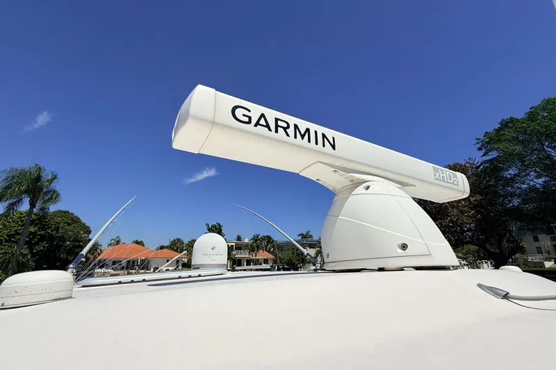 Slide: The Image of Garmin radar on 2008 Grady-White Express 360 boat under clear blue sky. - 22