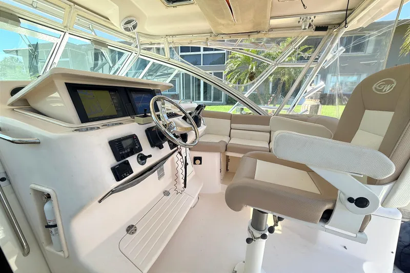 Slide: The Image of 2008 Grady-White Express 360 helm with modern controls and comfortable seating. - 5