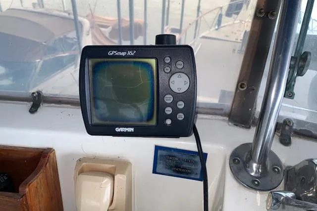 Slide: The Image of Garmin GPSmap 162 on 1976 Hatteras 43 Double Cabin boat dashboard. - 19