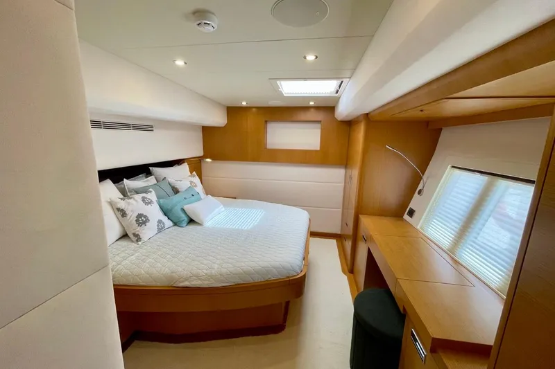 Slide: The Image of Luxurious bedroom interior of 2018 Serenity 64 yacht with modern design and cozy bedding. - 50