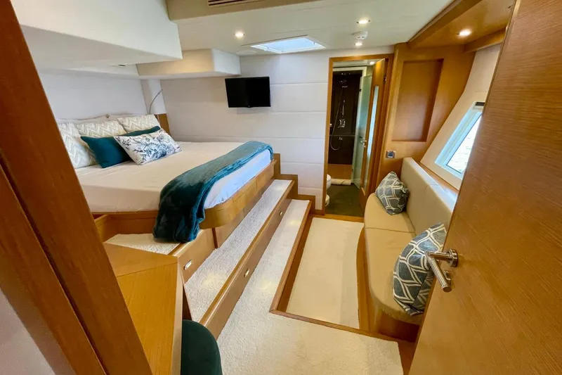 Slide: The Image of Luxurious Serenity 64 yacht bedroom interior with modern design and cozy seating, 2018 model. - 55