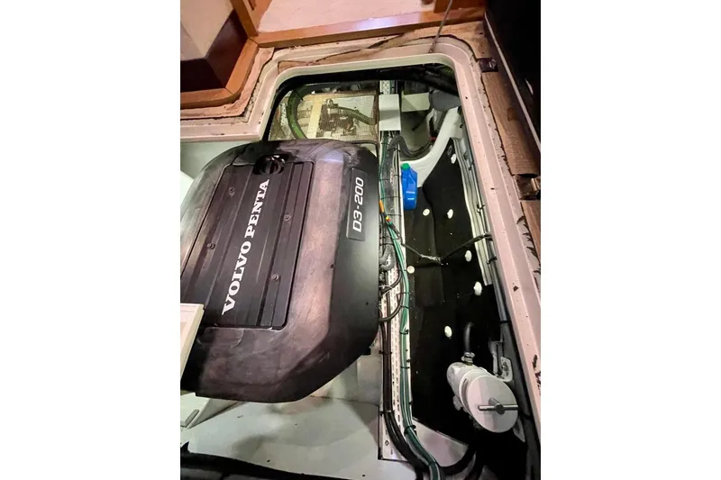Slide: The Image of Engine compartment of a 2018 Serenity 64 yacht with Volvo Penta D3-200 engine. - 68