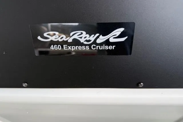 Slide: The Image of 1989 Sea Ray 460 Express Cruiser logo on a black background. - 15