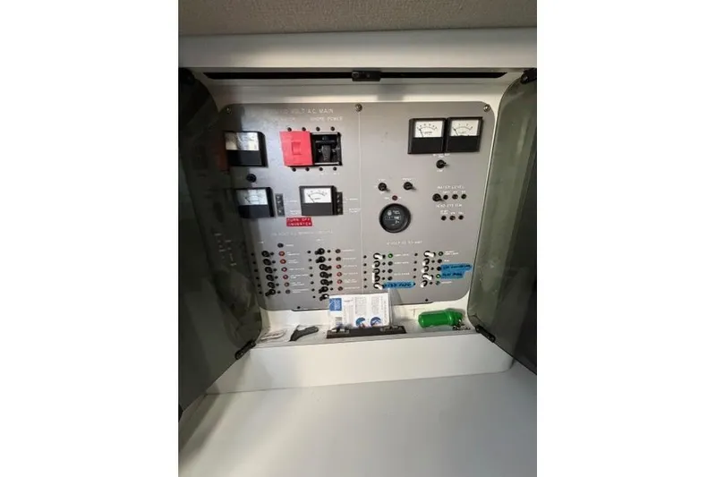 Slide: The Image of Electrical control panel of a 1989 Sea Ray 460 Express Cruiser boat. - 20