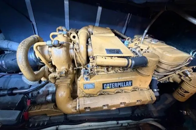 Slide: The Image of Caterpillar engine in 1989 Sea Ray 460 Express Cruiser, showcasing marine engineering. - 27