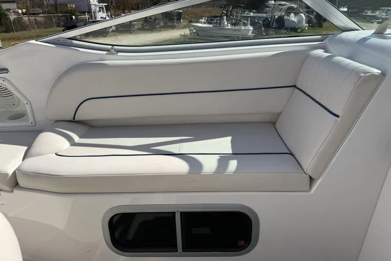 Slide: The Image of White seating area on a 2000 Chaparral Signature 240 boat. - 17