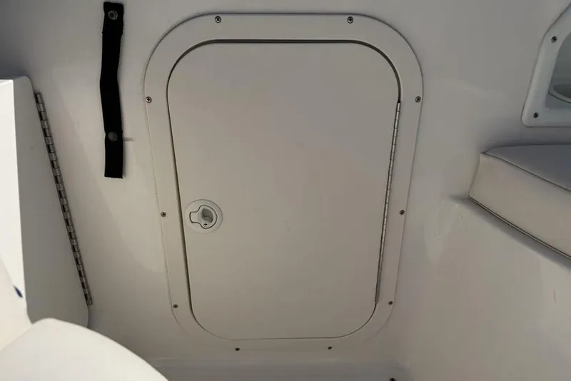 Slide: The Image of Hatch door on 2000 Chaparral Signature 240 boat interior. - 25