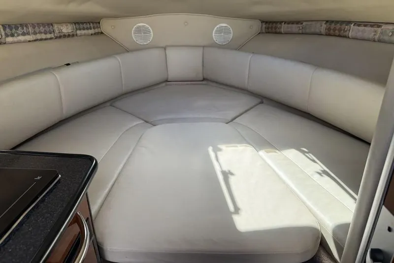Slide: The Image of Interior cabin of 2000 Chaparral Signature 240 boat with cushioned seating. - 39