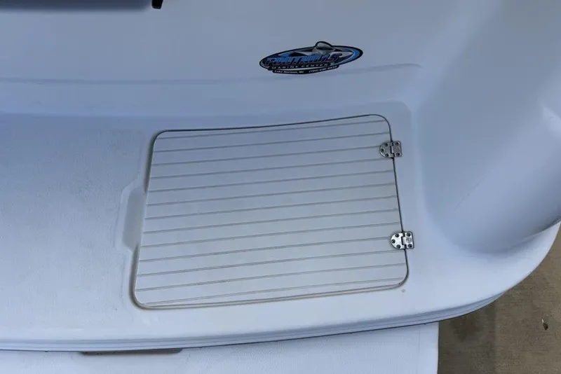 Slide: The Image of Rear deck of 2000 Chaparral Signature 240 boat with hatch and logo. - 41