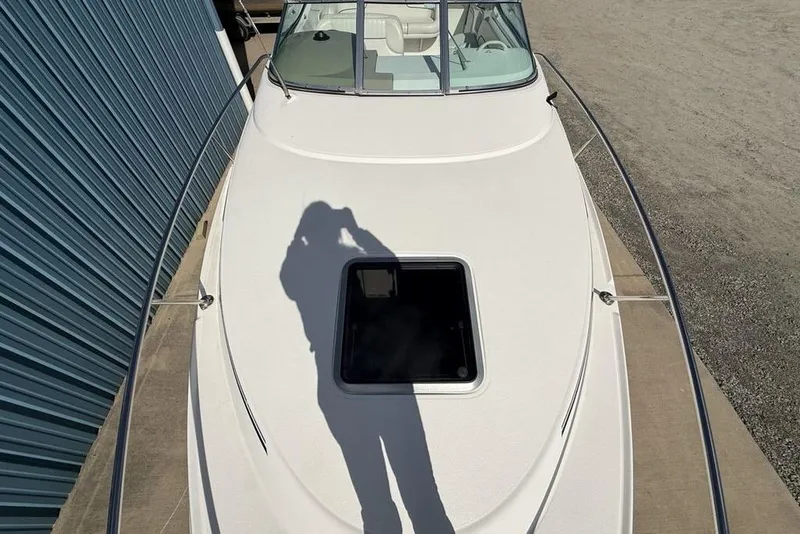 Slide: The Image of 2000 Chaparral Signature 240 boat deck with shadow and open hatch. - 42