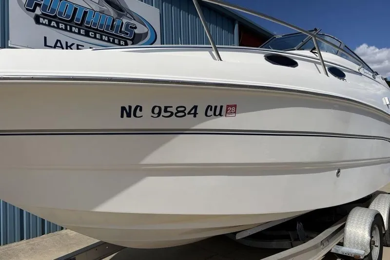 Slide: The Image of 2000 Chaparral Signature 240 boat on trailer at Foothills Marine Center. - 8