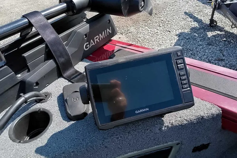 Slide: The Image of Garmin device on 2018 Tracker Targa V-18 Combo boat dashboard, outdoor setting. - 22