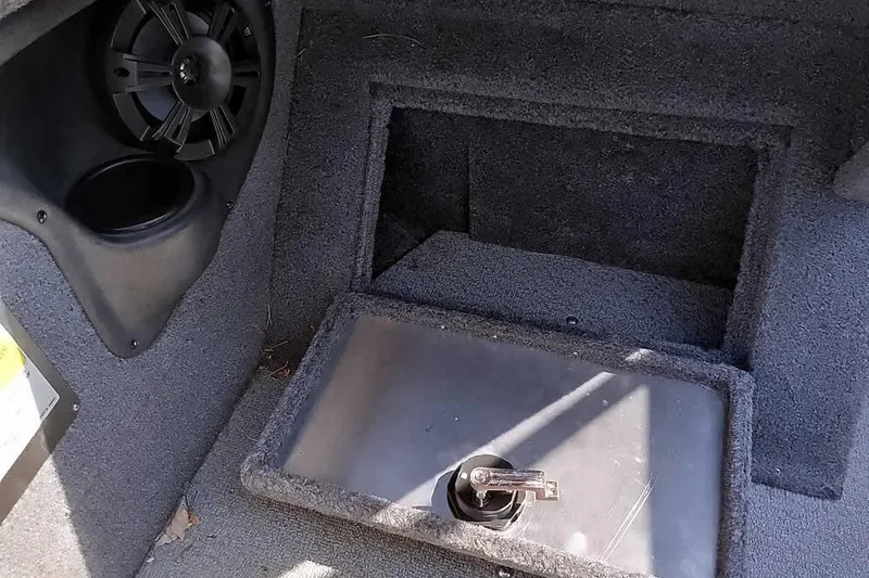 Slide: The Image of 2018 Tracker Targa V-18 Combo boat interior with speaker and storage compartment. - 28