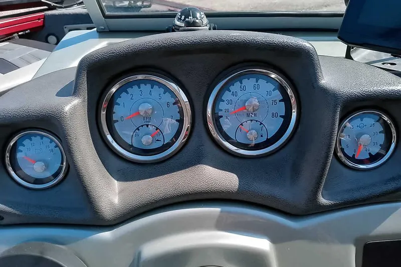Slide: The Image of Dashboard of 2018 Tracker Targa V-18 Combo boat with speedometer and gauges. - 33