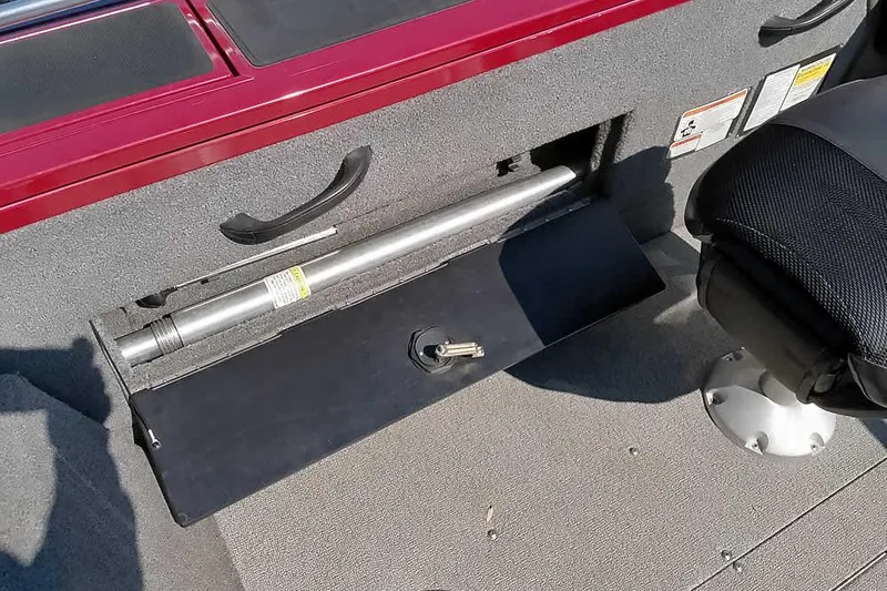 Slide: The Image of 2018 Tracker Targa V-18 Combo boat interior with storage compartment and seat. - 38