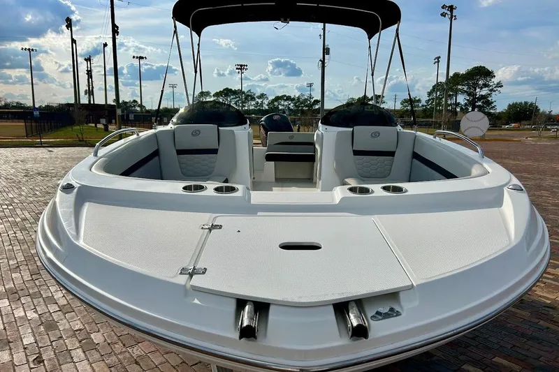 Slide: The Image of 2024 Hurricane Sundeck Sport 218 OB boat with sleek design and spacious seating. - 12