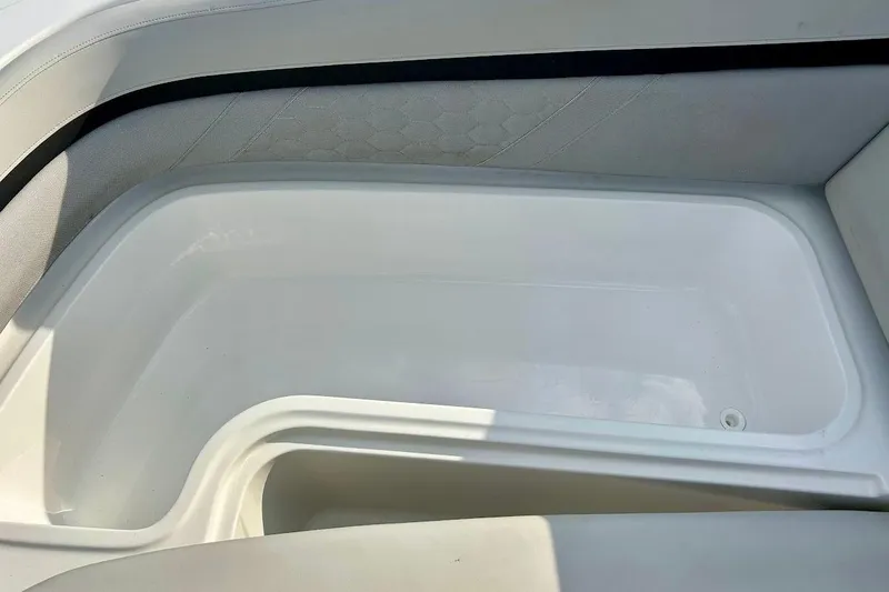 Slide: The Image of 2024 Hurricane Sundeck Sport 218 OB boat interior storage compartment. - 29