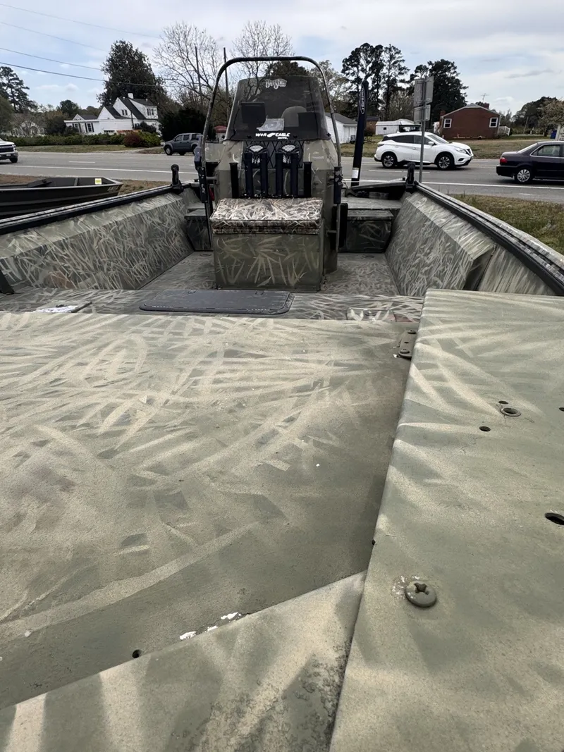 Slide: The Image of War Eagle 2072 Ducks Unlimited boat, 2011, featuring camouflage design. - 4