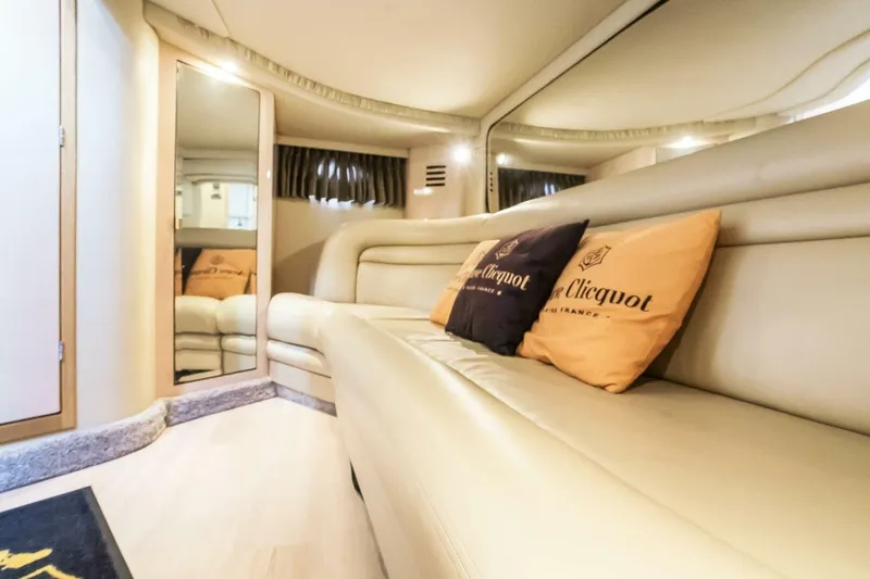 Slide: The Image of Luxurious interior of 2003 Sea Ray Sundancer 460 yacht with plush seating and elegant decor. - 33