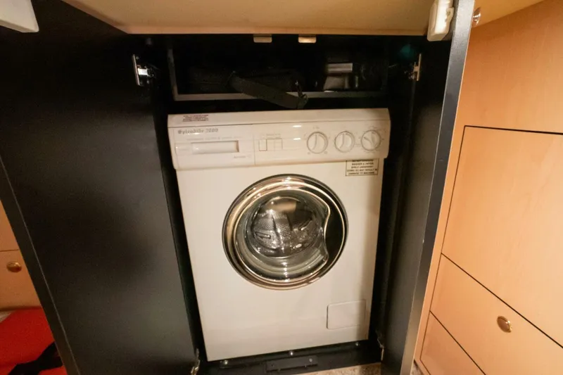 Slide: The Image of Washing machine inside 2003 Sea Ray Sundancer 460 yacht cabinet. - 39