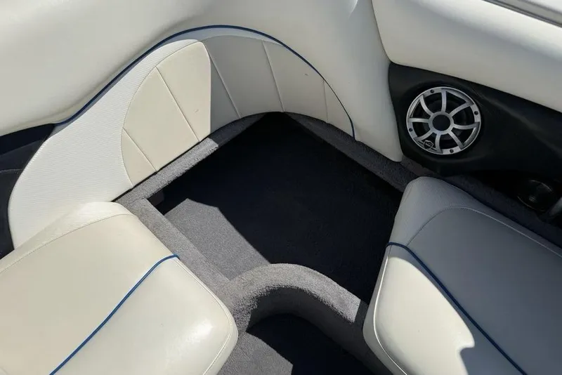 Slide: The Image of Interior seating of a 2008 Malibu Sunscape 23 LSV boat with speaker detail. - 28