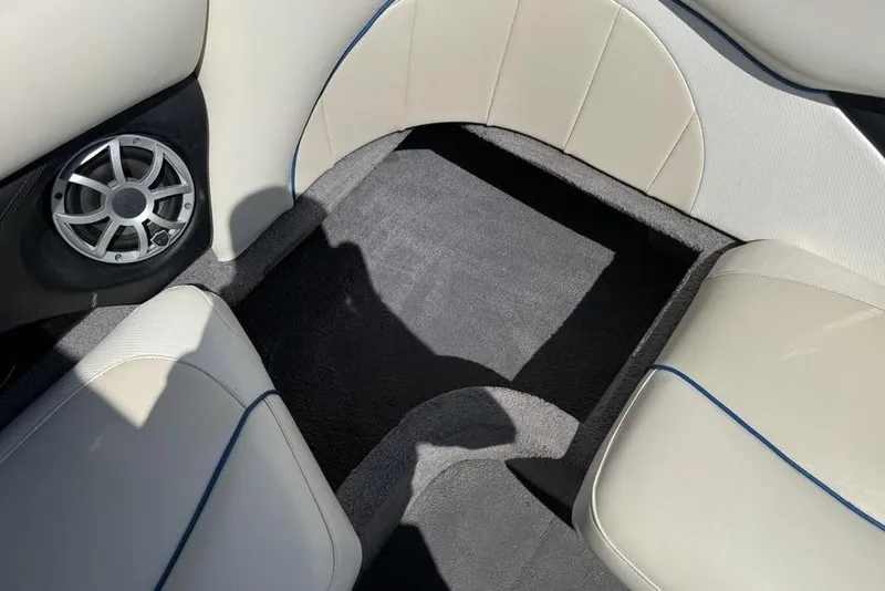 Slide: The Image of Interior of 2008 Malibu Sunscape 23 LSV boat with speaker and seating. - 29