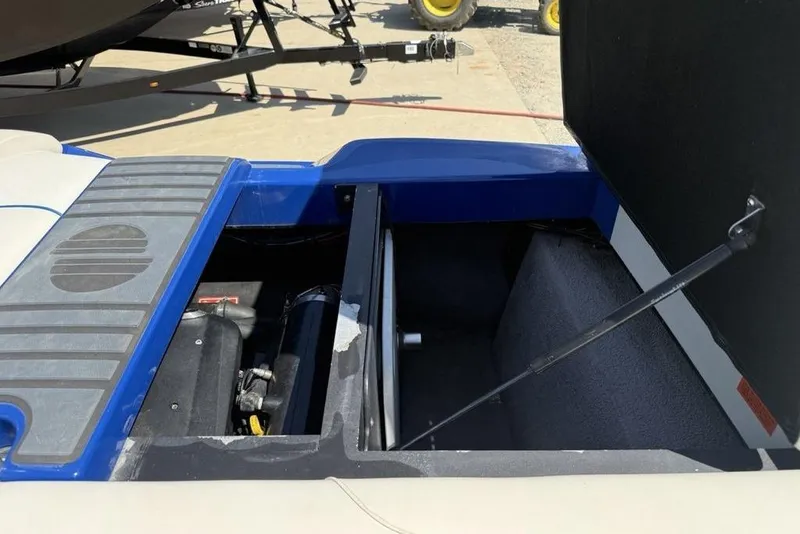 Slide: The Image of Open engine compartment of a 2008 Malibu Sunscape 23 LSV boat. - 33