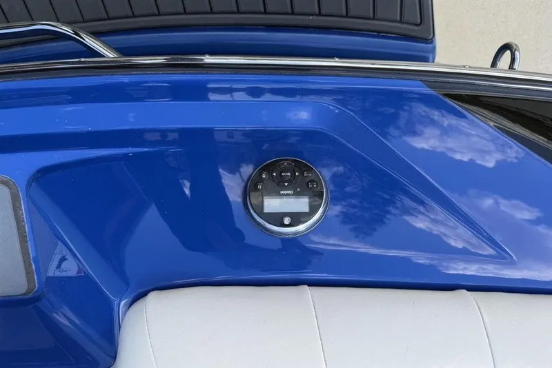 Slide: The Image of Blue dashboard of 2008 Malibu Sunscape 23 LSV boat with control panel. - 38