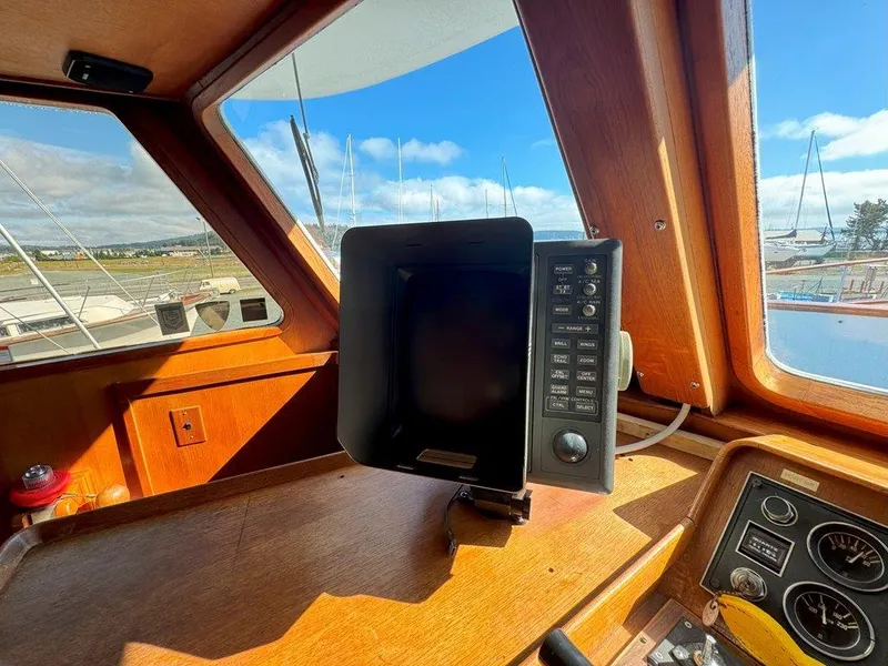 Slide: The Image of Interior view of 1980 Ocean Alexander 50 MK1 yacht cockpit with navigation equipment. - 22
