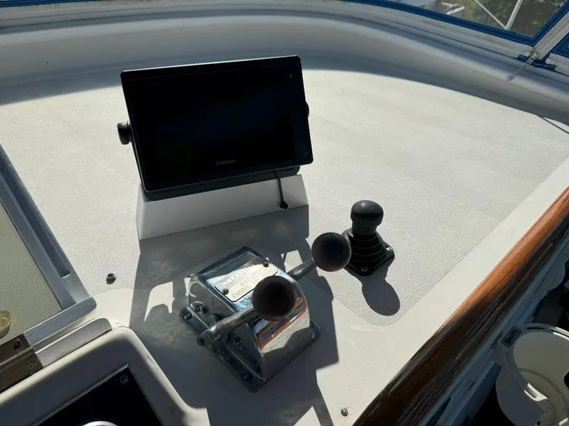 Slide: The Image of Control panel of a 1980 Ocean Alexander 50 MK1 yacht with navigation equipment. - 39