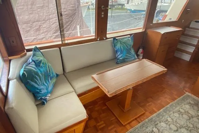 Slide: The Image of Interior of 1980 Ocean Alexander 50 Mark I yacht with cozy seating and nautical decor. - 4