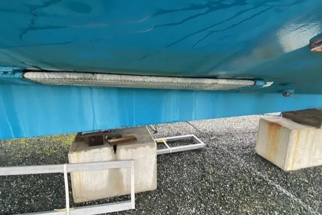 Slide: The Image of Bottom view of a 1980 Ocean Alexander 50 Mark I yacht on dry dock. - 55