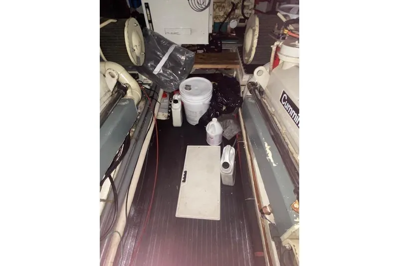 Slide: The Image of Engine room of 1980 Ocean Alexander 50 Mark I with maintenance supplies. - 69