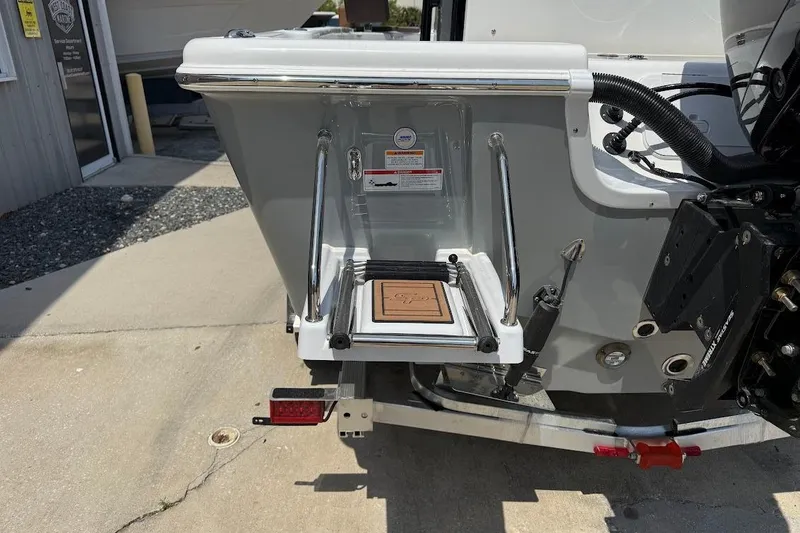 Slide: The Image of 2026 Sea Pro 250 Bay boat stern with swim platform and ladder. - 5