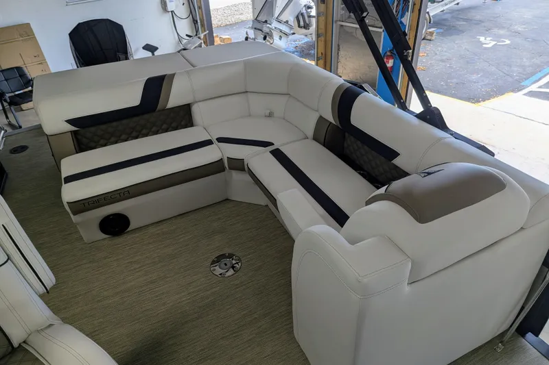 Slide: The Image of Luxurious seating on 2026 Trifecta 21C SS pontoon boat, featuring modern design and comfort. - 12