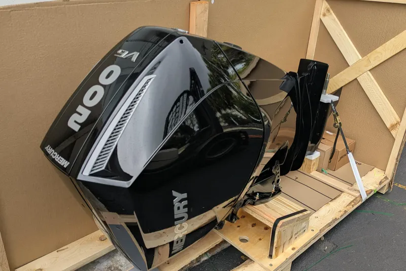 Slide: The Image of Mercury 200 HP outboard motor in crate, Trifecta 21C SS 2026 model. - 6