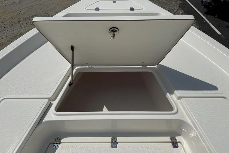Slide: The Image of Open storage compartment on 2023 Bulls Bay 2400 boat deck. - 11