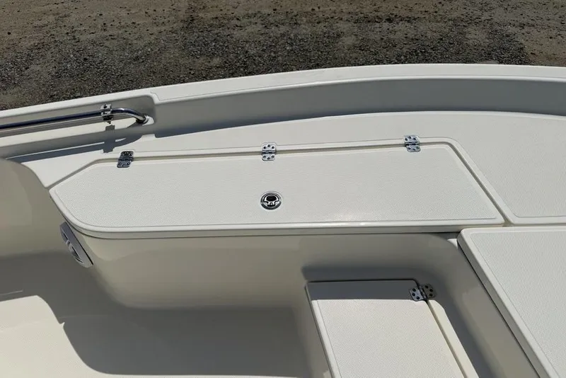 Slide: The Image of 2023 Bulls Bay 2400 boat deck with storage compartments and stainless steel railing. - 12